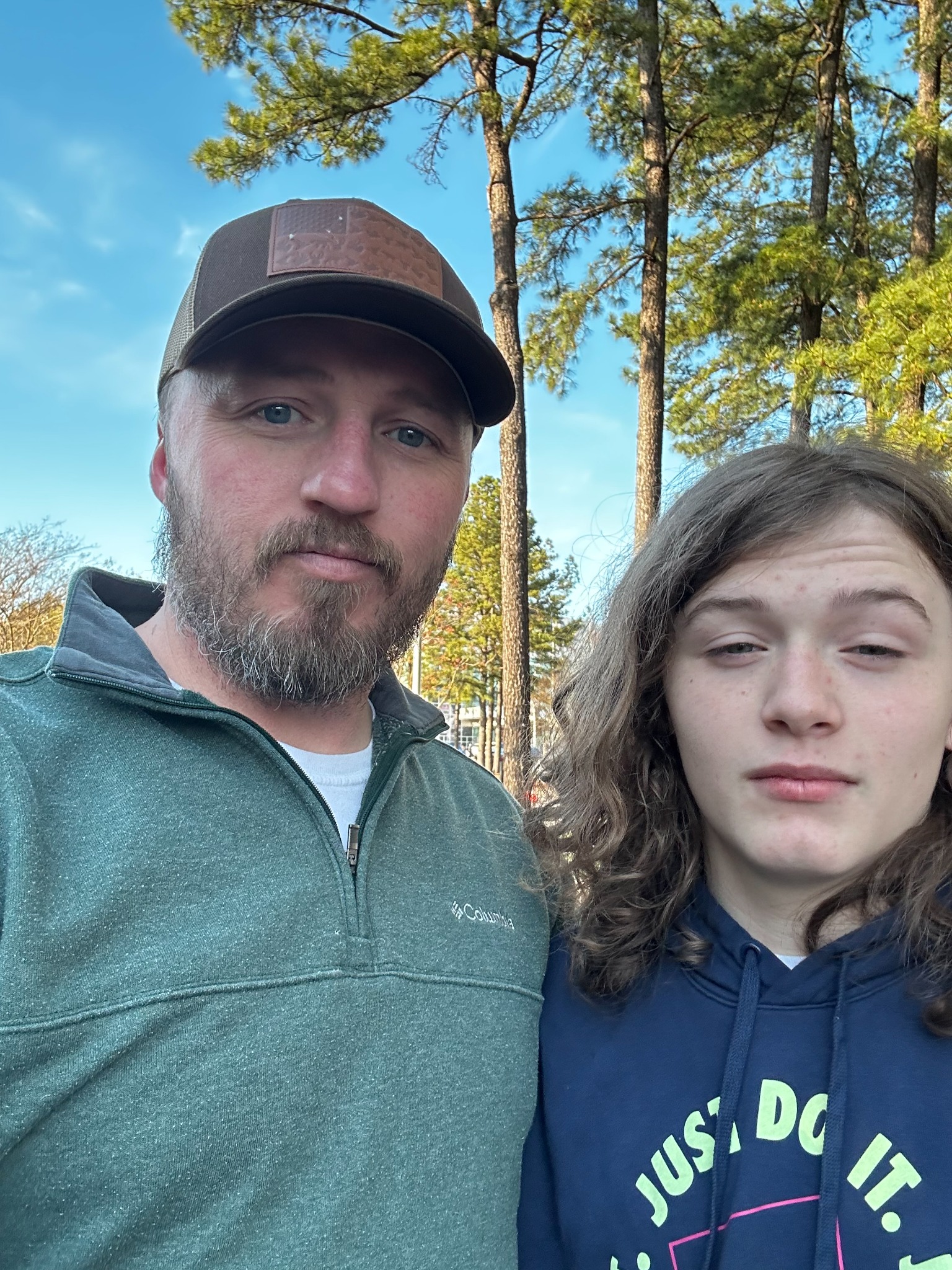 Owner with daughter posing together